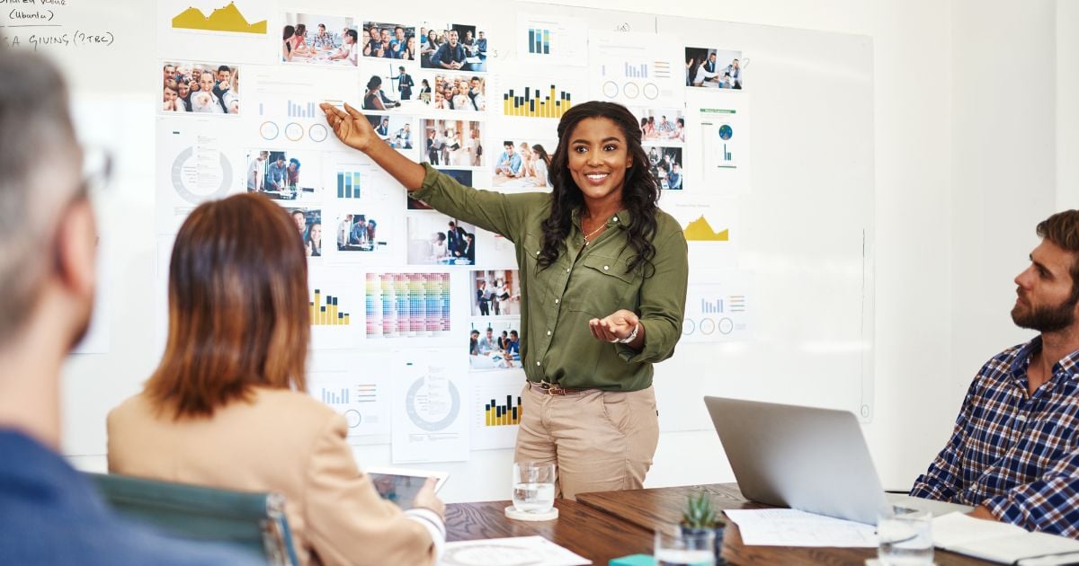 cropped shot of a business woman giving a presentation in the boardroom