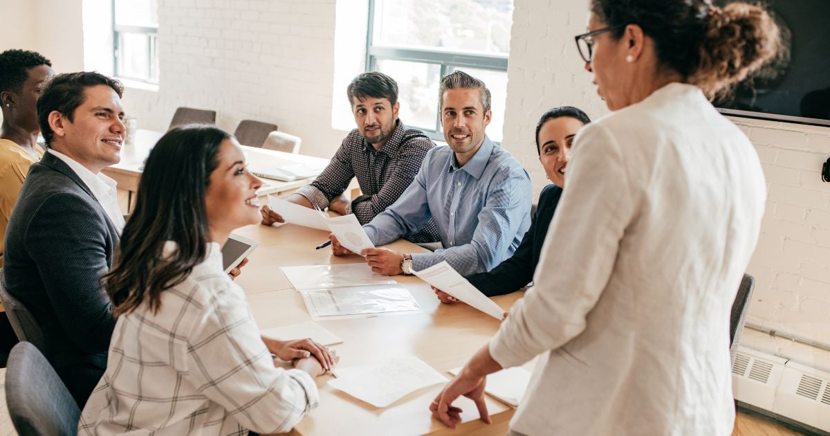 Diverse business team at a conference table.